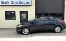 2014 Kia Forte with professional window tint in North Bay